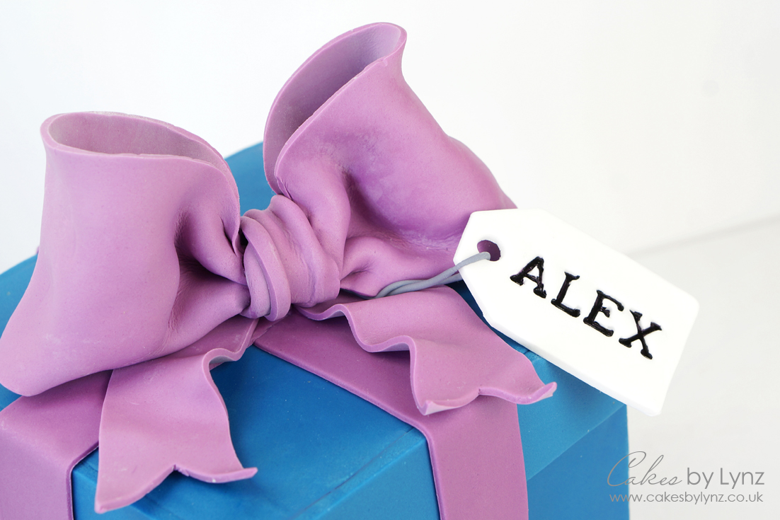 How to make a gumpaste bow cake topper